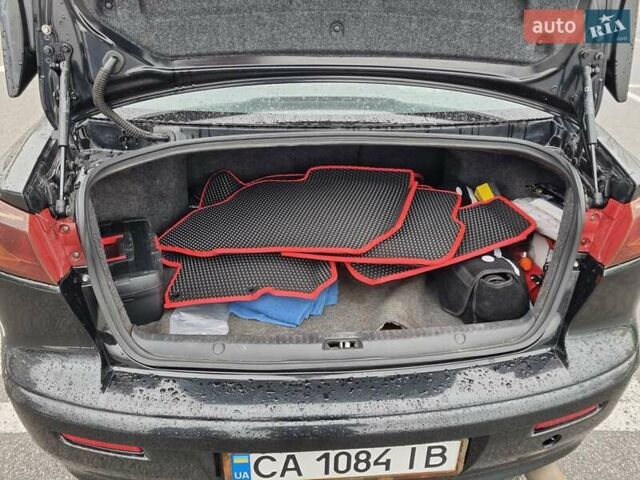 Чорний Міцубісі Lancer, об'ємом двигуна 0 л та пробігом 169 тис. км за 7200 $, фото 6 на Automoto.ua