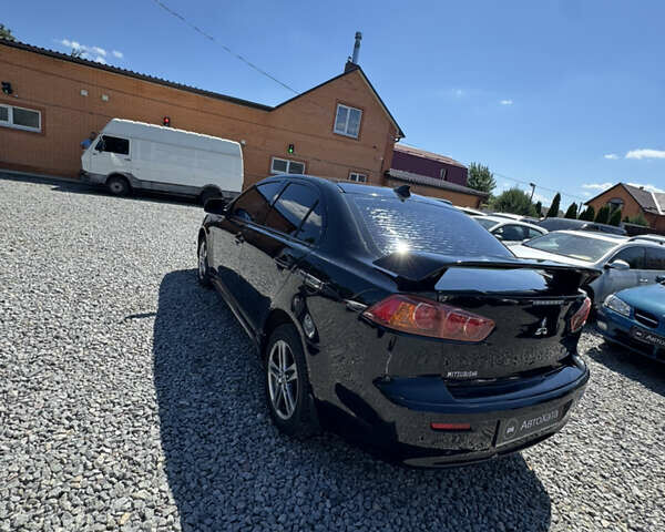 Чорний Міцубісі Lancer, об'ємом двигуна 2 л та пробігом 253 тис. км за 6400 $, фото 5 на Automoto.ua