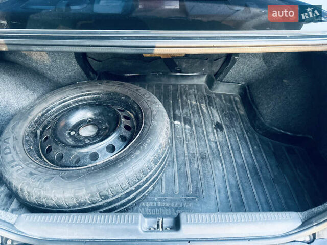 Чорний Міцубісі Lancer, об'ємом двигуна 1.6 л та пробігом 270 тис. км за 4500 $, фото 11 на Automoto.ua