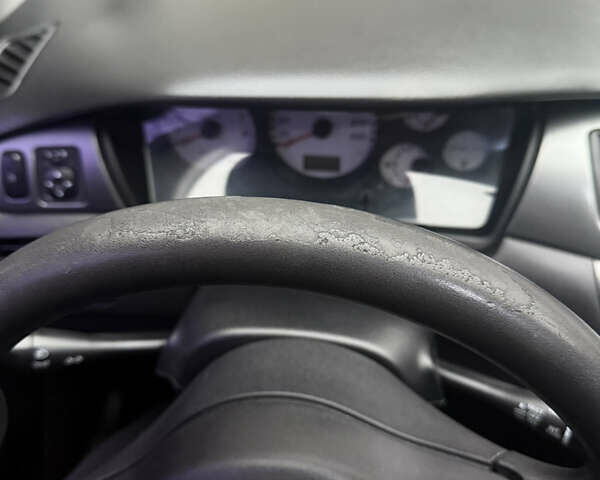 Чорний Міцубісі Lancer, об'ємом двигуна 1.58 л та пробігом 256 тис. км за 3700 $, фото 29 на Automoto.ua