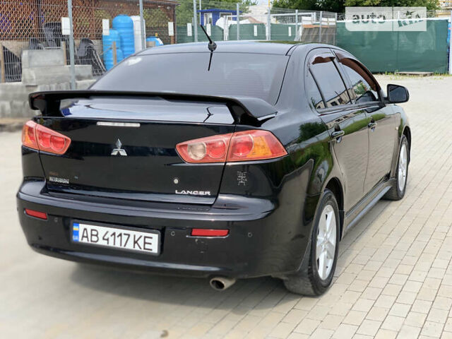 Чорний Міцубісі Lancer, об'ємом двигуна 2 л та пробігом 213 тис. км за 5250 $, фото 4 на Automoto.ua