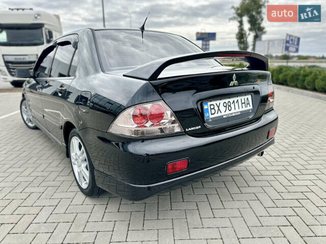 Чорний Міцубісі Lancer, об'ємом двигуна 2 л та пробігом 275 тис. км за 5300 $, фото 12 на Automoto.ua