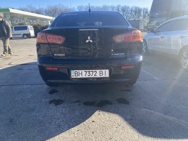 Черный Мицубиси Лансер, объемом двигателя 2 л и пробегом 372 тыс. км за 6200 $, фото 5 на Automoto.ua