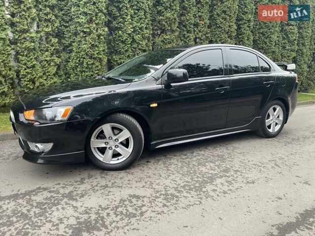 Чорний Міцубісі Lancer, об'ємом двигуна 2 л та пробігом 69 тис. км за 6200 $, фото 5 на Automoto.ua