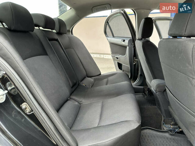 Чорний Міцубісі Lancer, об'ємом двигуна 2 л та пробігом 192 тис. км за 6500 $, фото 19 на Automoto.ua
