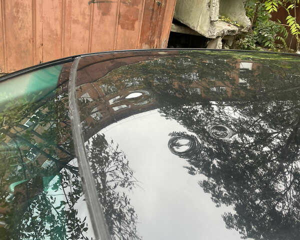 Черный Мицубиси Лансер, объемом двигателя 1.6 л и пробегом 258 тыс. км за 2999 $, фото 5 на Automoto.ua