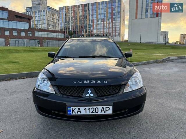 Черный Мицубиси Лансер, объемом двигателя 1.58 л и пробегом 237 тыс. км за 3950 $, фото 3 на Automoto.ua