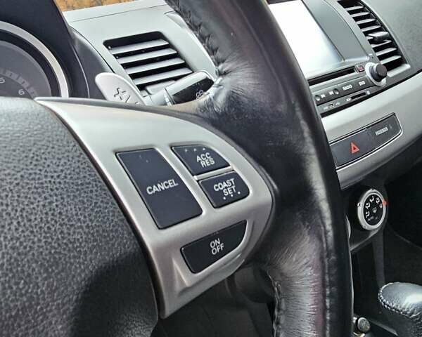 Міцубісі Lancer 2007 у Києві на Automoto.ua Чорний Міцубісі Lancer, об'ємом двигуна 2 л та пробігом 115 тис. км за 5000 $, фото 26 на Automoto.ua
