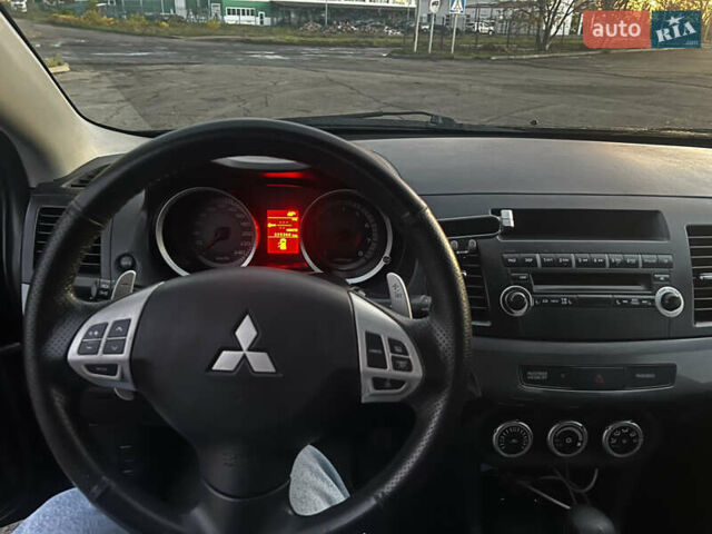 Мицубиси Лансер 2007 в Вознесенске на Automoto.ua Черный Мицубиси Лансер, объемом двигателя 2 л и пробегом 225 тыс. км за 5900 $, фото 16 на Automoto.ua