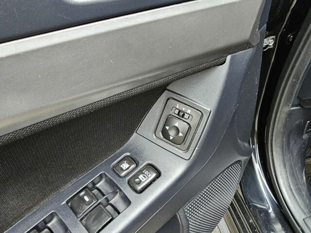 Черный Мицубиси Лансер, объемом двигателя 2 л и пробегом 115 тыс. км за 5000 $, фото 18 на Automoto.ua