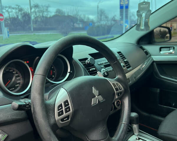 Черный Мицубиси Лансер, объемом двигателя 2 л и пробегом 350 тыс. км за 6700 $, фото 13 на Automoto.ua