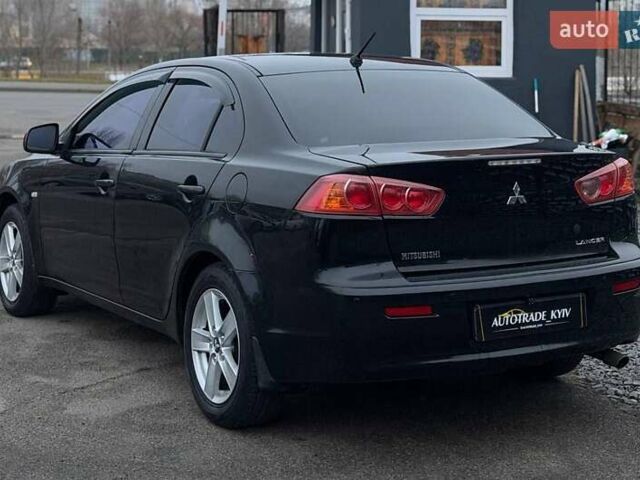 Черный Мицубиси Лансер, объемом двигателя 1.5 л и пробегом 245 тыс. км за 4499 $, фото 2 на Automoto.ua