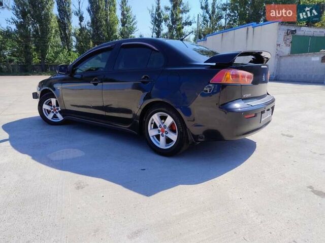 Чорний Міцубісі Lancer, об'ємом двигуна 2 л та пробігом 268 тис. км за 5000 $, фото 9 на Automoto.ua
