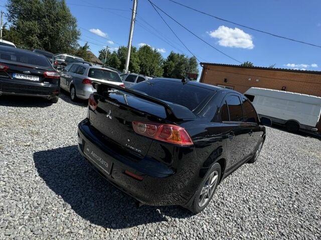 Чорний Міцубісі Lancer, об'ємом двигуна 2 л та пробігом 253 тис. км за 6400 $, фото 3 на Automoto.ua