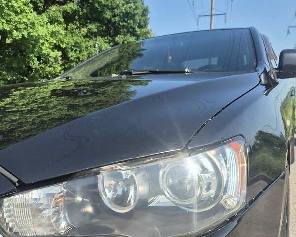 Чорний Міцубісі Lancer, об'ємом двигуна 2 л та пробігом 243 тис. км за 6600 $, фото 8 на Automoto.ua