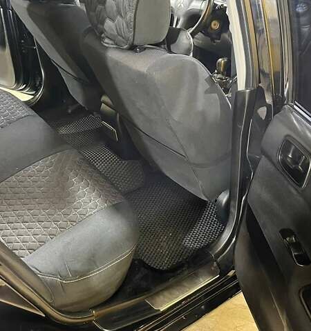 Черный Мицубиси Лансер, объемом двигателя 1.6 л и пробегом 249 тыс. км за 5000 $, фото 16 на Automoto.ua