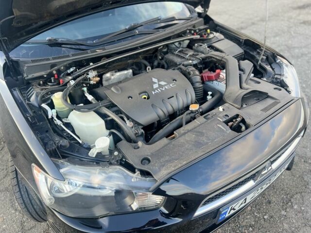 Черный Мицубиси Лансер, объемом двигателя 2 л и пробегом 170 тыс. км за 7900 $, фото 6 на Automoto.ua