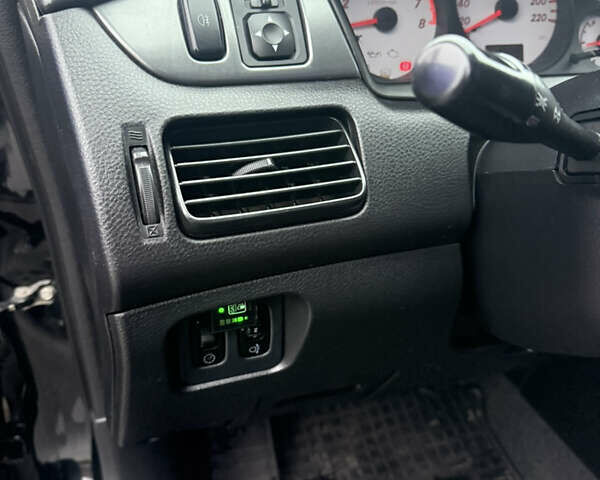 Чорний Міцубісі Lancer, об'ємом двигуна 1.58 л та пробігом 256 тис. км за 3700 $, фото 14 на Automoto.ua