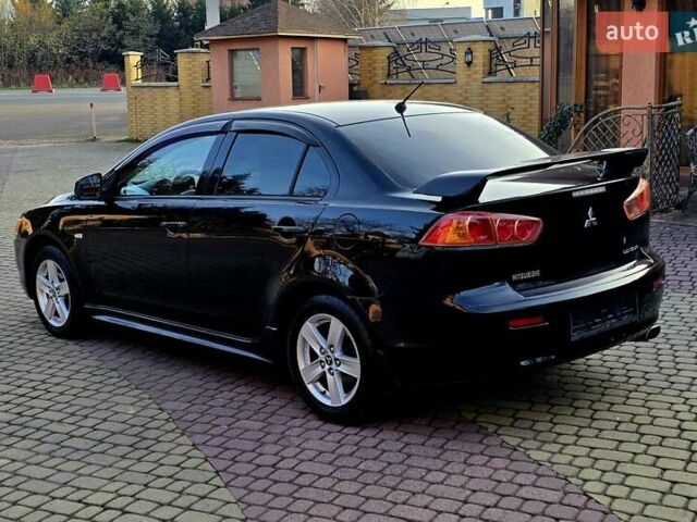 Чорний Міцубісі Lancer, об'ємом двигуна 2 л та пробігом 260 тис. км за 6555 $, фото 11 на Automoto.ua