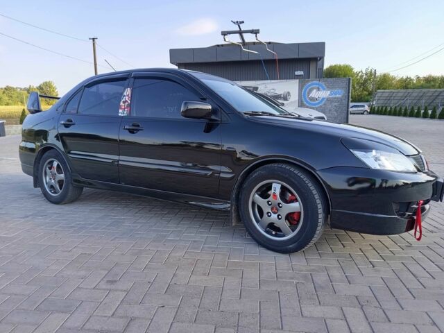 Чорний Міцубісі Lancer, об'ємом двигуна 1.6 л та пробігом 3 тис. км за 4500 $, фото 1 на Automoto.ua