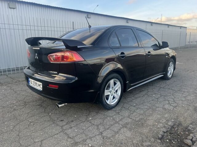 Черный Мицубиси Лансер, объемом двигателя 2 л и пробегом 170 тыс. км за 7900 $, фото 20 на Automoto.ua