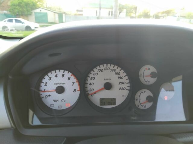 Черный Мицубиси Лансер, объемом двигателя 1.6 л и пробегом 32 тыс. км за 9000 $, фото 21 на Automoto.ua