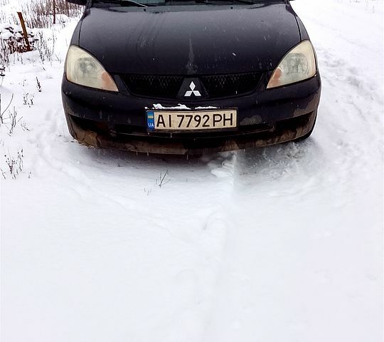 Черный Мицубиси Лансер, объемом двигателя 1.6 л и пробегом 0 тыс. км за 3700 $, фото 4 на Automoto.ua