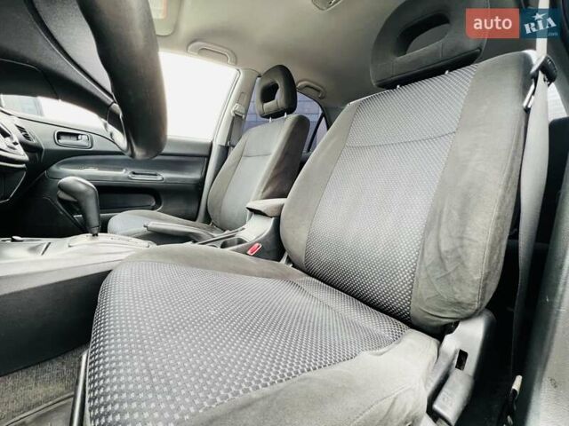 Чорний Міцубісі Lancer, об'ємом двигуна 1.6 л та пробігом 243 тис. км за 4950 $, фото 38 на Automoto.ua
