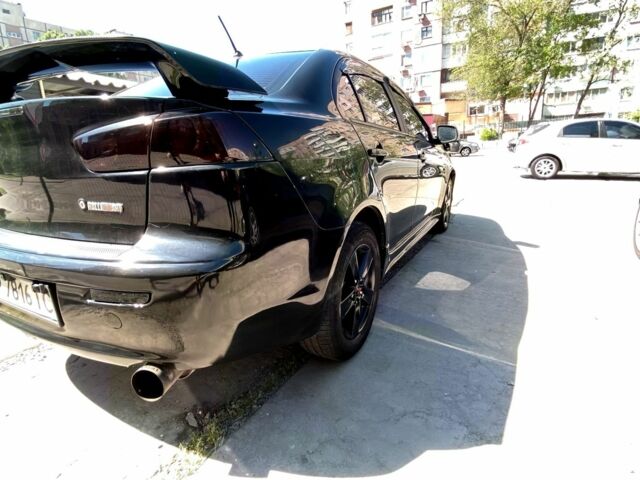 Чорний Міцубісі Lancer, об'ємом двигуна 2 л та пробігом 265 тис. км за 6300 $, фото 2 на Automoto.ua