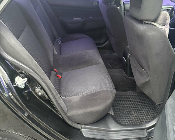 Чорний Міцубісі Lancer, об'ємом двигуна 1.58 л та пробігом 256 тис. км за 3700 $, фото 21 на Automoto.ua