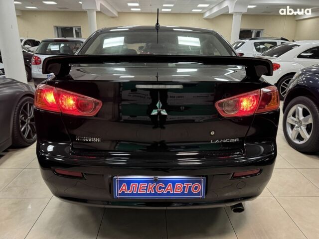 Черный Мицубиси Лансер, объемом двигателя 0 л и пробегом 201 тыс. км за 6900 $, фото 11 на Automoto.ua