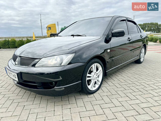 Чорний Міцубісі Lancer, об'ємом двигуна 2 л та пробігом 275 тис. км за 5300 $, фото 8 на Automoto.ua