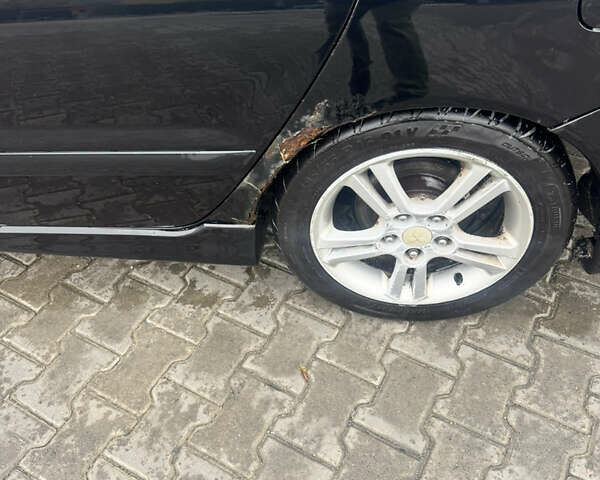 Чорний Міцубісі Lancer, об'ємом двигуна 2 л та пробігом 210 тис. км за 5500 $, фото 3 на Automoto.ua