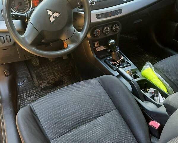 Черный Мицубиси Лансер, объемом двигателя 1.5 л и пробегом 240 тыс. км за 6900 $, фото 1 на Automoto.ua