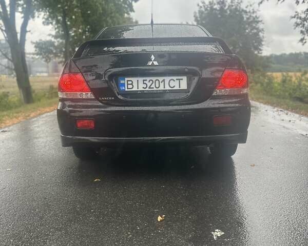 Чорний Міцубісі Lancer, об'ємом двигуна 1.6 л та пробігом 310 тис. км за 5100 $, фото 26 на Automoto.ua