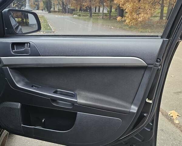 Міцубісі Lancer 2007 у Києві на Automoto.ua Чорний Міцубісі Lancer, об'ємом двигуна 2 л та пробігом 115 тис. км за 5000 $, фото 15 на Automoto.ua