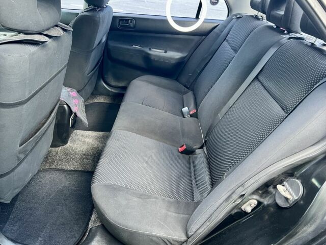 Чорний Міцубісі Lancer, об'ємом двигуна 1.6 л та пробігом 228 тис. км за 3499 $, фото 4 на Automoto.ua