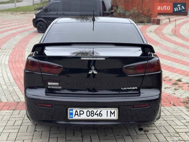 Черный Мицубиси Лансер, объемом двигателя 2 л и пробегом 217 тыс. км за 5500 $, фото 6 на Automoto.ua