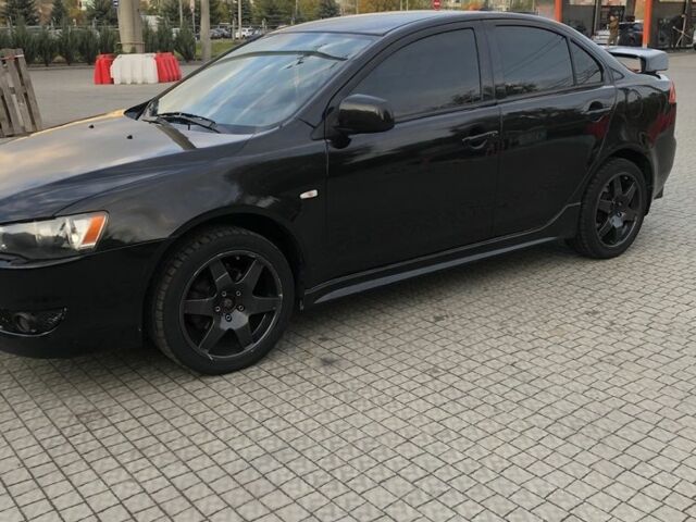 Чорний Міцубісі Lancer, об'ємом двигуна 2 л та пробігом 194 тис. км за 5950 $, фото 6 на Automoto.ua