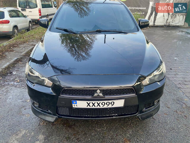 Чорний Міцубісі Lancer, об'ємом двигуна 2 л та пробігом 222 тис. км за 7500 $, фото 7 на Automoto.ua