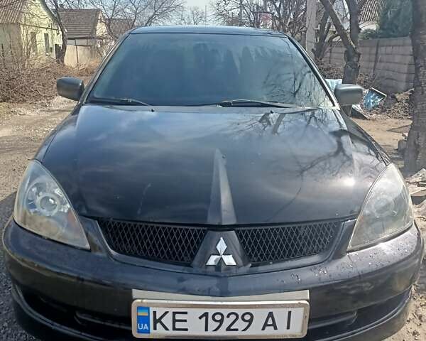 Чорний Міцубісі Lancer, об'ємом двигуна 2 л та пробігом 282 тис. км за 5700 $, фото 4 на Automoto.ua