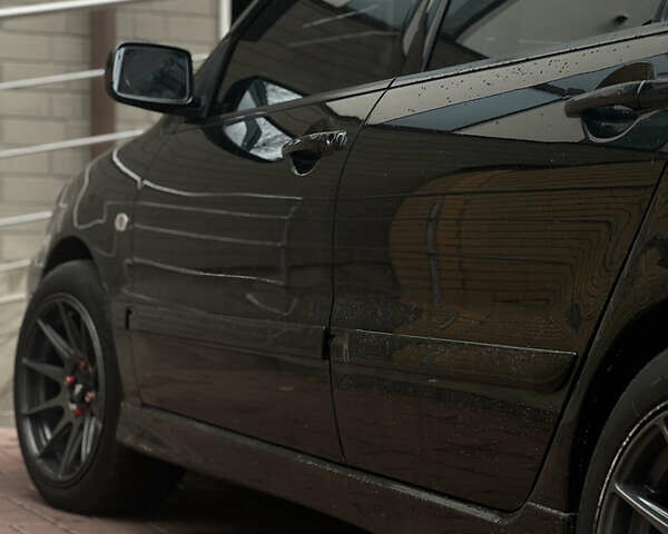 Черный Мицубиси Лансер, объемом двигателя 1.6 л и пробегом 211 тыс. км за 5700 $, фото 41 на Automoto.ua