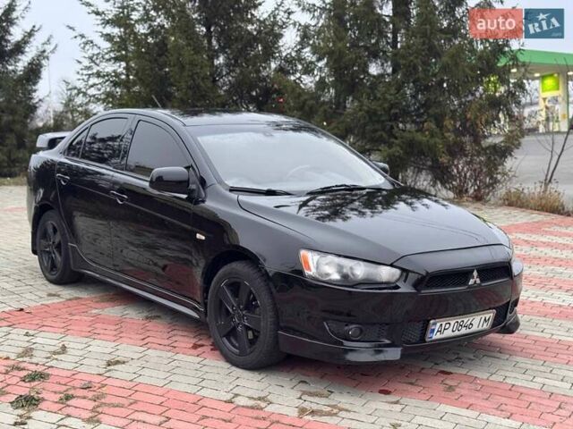 Черный Мицубиси Лансер, объемом двигателя 2 л и пробегом 217 тыс. км за 5500 $, фото 2 на Automoto.ua