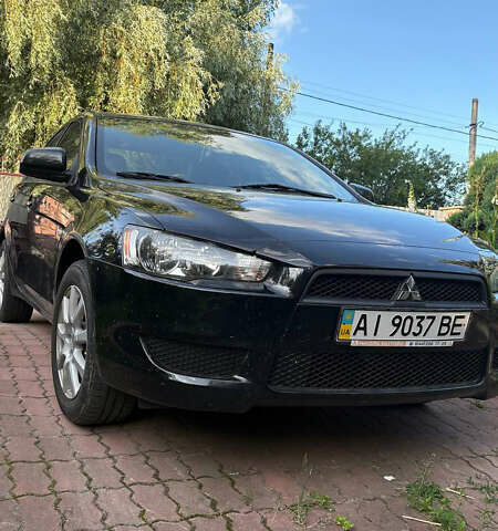 Черный Мицубиси Лансер, объемом двигателя 1.5 л и пробегом 111 тыс. км за 7500 $, фото 7 на Automoto.ua