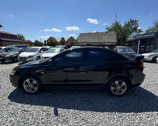 Чорний Міцубісі Lancer, об'ємом двигуна 2 л та пробігом 253 тис. км за 6400 $, фото 6 на Automoto.ua