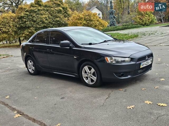Міцубісі Lancer 2007 у Києві на Automoto.ua Чорний Міцубісі Lancer, об'ємом двигуна 2 л та пробігом 115 тис. км за 5000 $, фото 6 на Automoto.ua