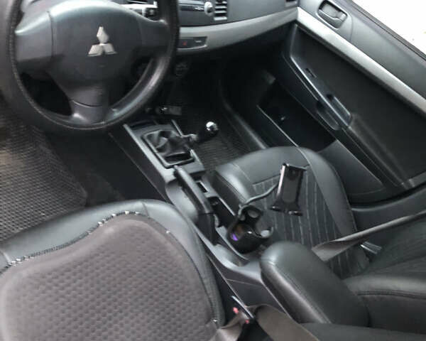 Чорний Міцубісі Lancer, об'ємом двигуна 1.5 л та пробігом 244 тис. км за 5000 $, фото 8 на Automoto.ua