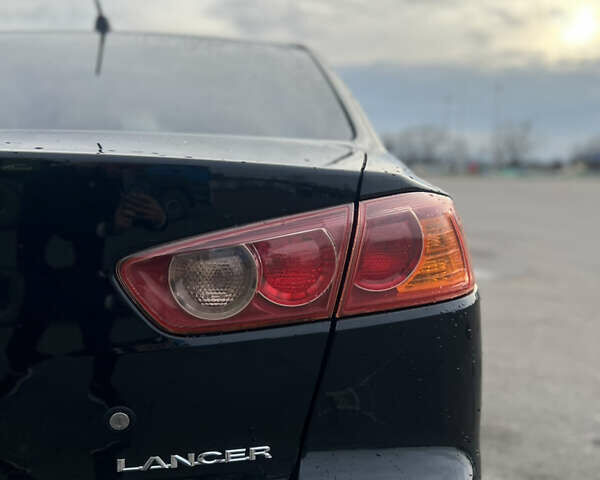Чорний Міцубісі Lancer, об'ємом двигуна 1.5 л та пробігом 209 тис. км за 5500 $, фото 12 на Automoto.ua