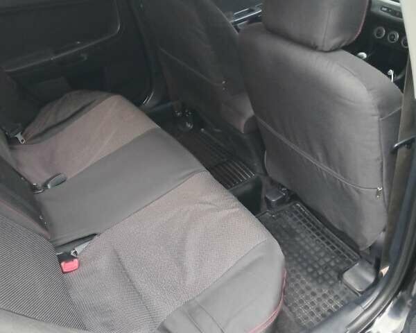 Чорний Міцубісі Lancer, об'ємом двигуна 2 л та пробігом 270 тис. км за 6700 $, фото 9 на Automoto.ua