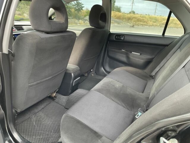Чорний Міцубісі Lancer, об'ємом двигуна 1.6 л та пробігом 260 тис. км за 4600 $, фото 16 на Automoto.ua